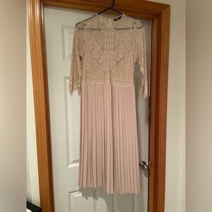 Nude lace dress with pleated bottoms from Zara